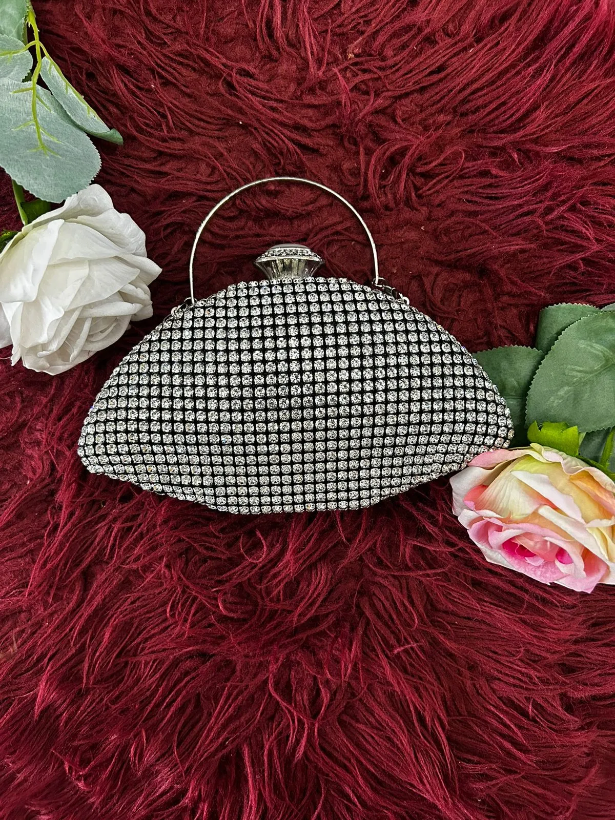 Oval shaped clutch bag